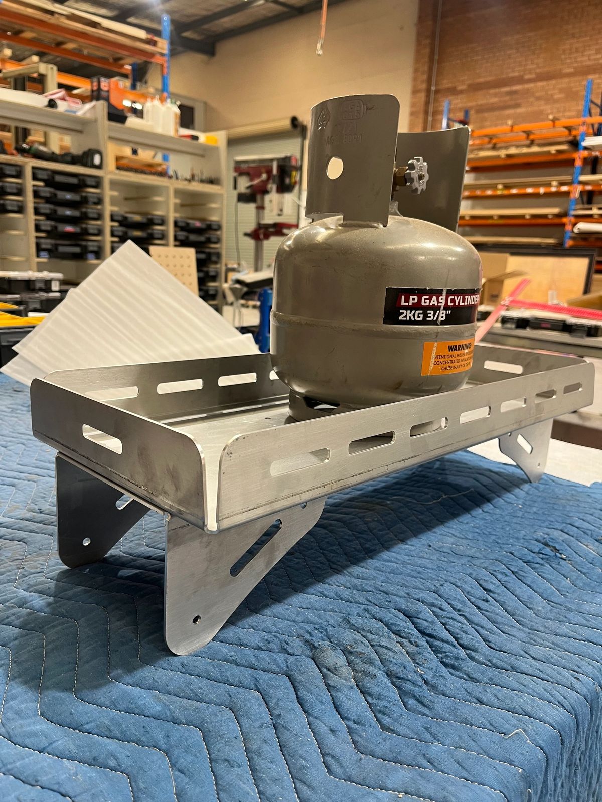 Custom wooden camper drawer assembly on a workshop bench.