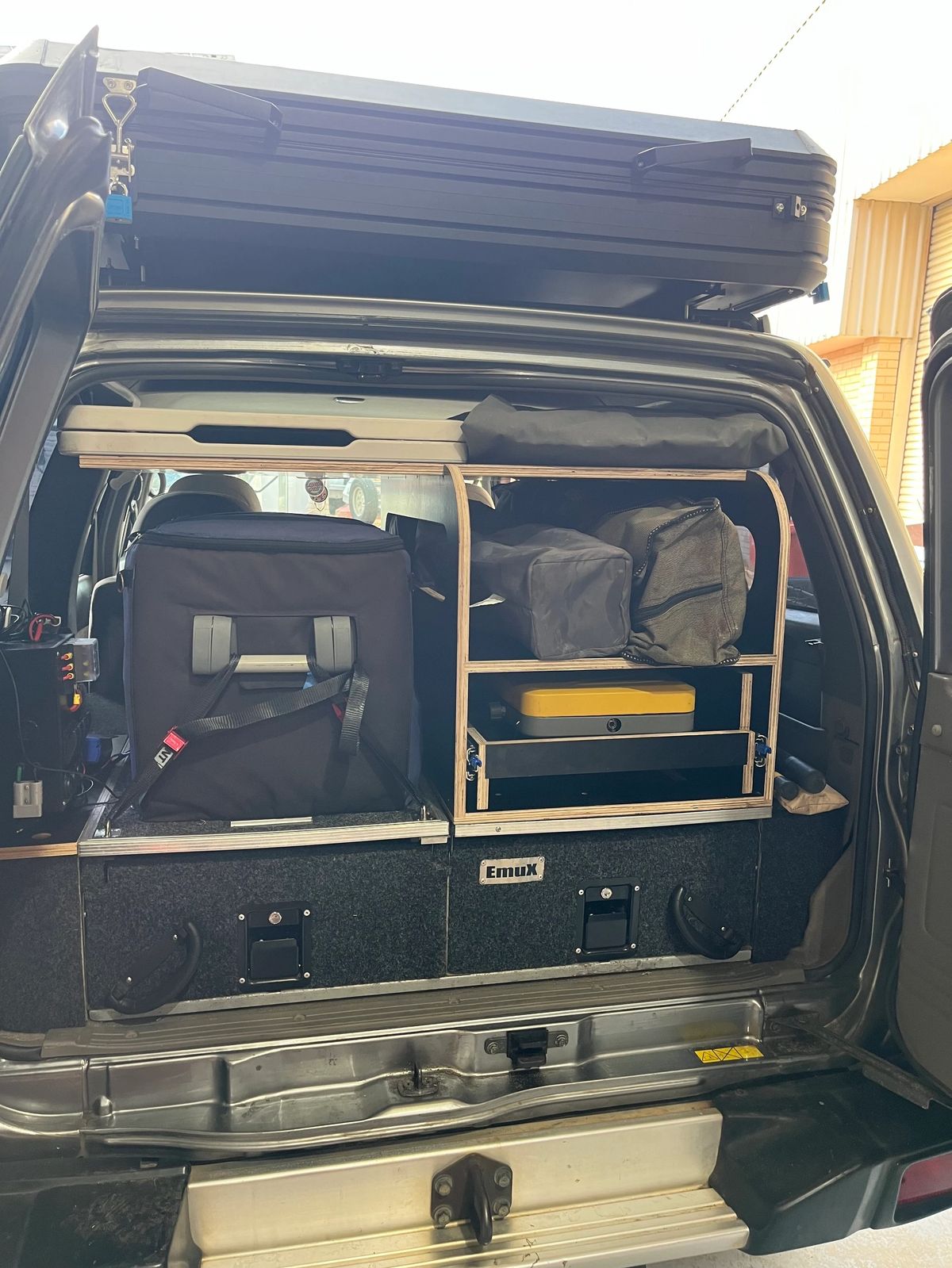 Custom storage drawers fitted in the rear of the Nissan Patrol camper.