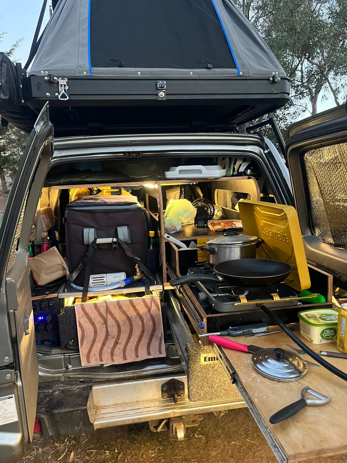 Camper storage and touring equipment fitted into the Nissan Patrol.